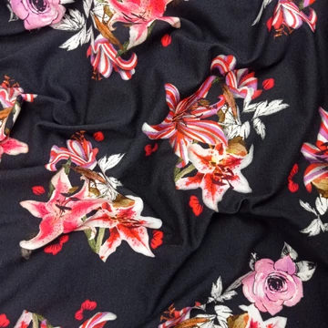 Viszkóz jersey - Fekete alapon liliom mintával, piros Viszkóz jersey - Fekete alapon liliom mintával, piros