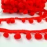 Kép 1/2 - Paszomány - Neon narancs/piros színben, lógó bogyókkal díszített