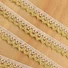 Kép 1/3 - Csipke szalag – Vajszínű és arany, cakkos pamut csipke, 1,7cm