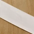 Kép 1/3 - Gumiszalag, szövött – Erős nadrág gumipertli fehér színben, 50mm