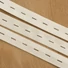 Kép 1/3 - Gumiszalag – Gomblyukas gumi fehér színben, 20mm
