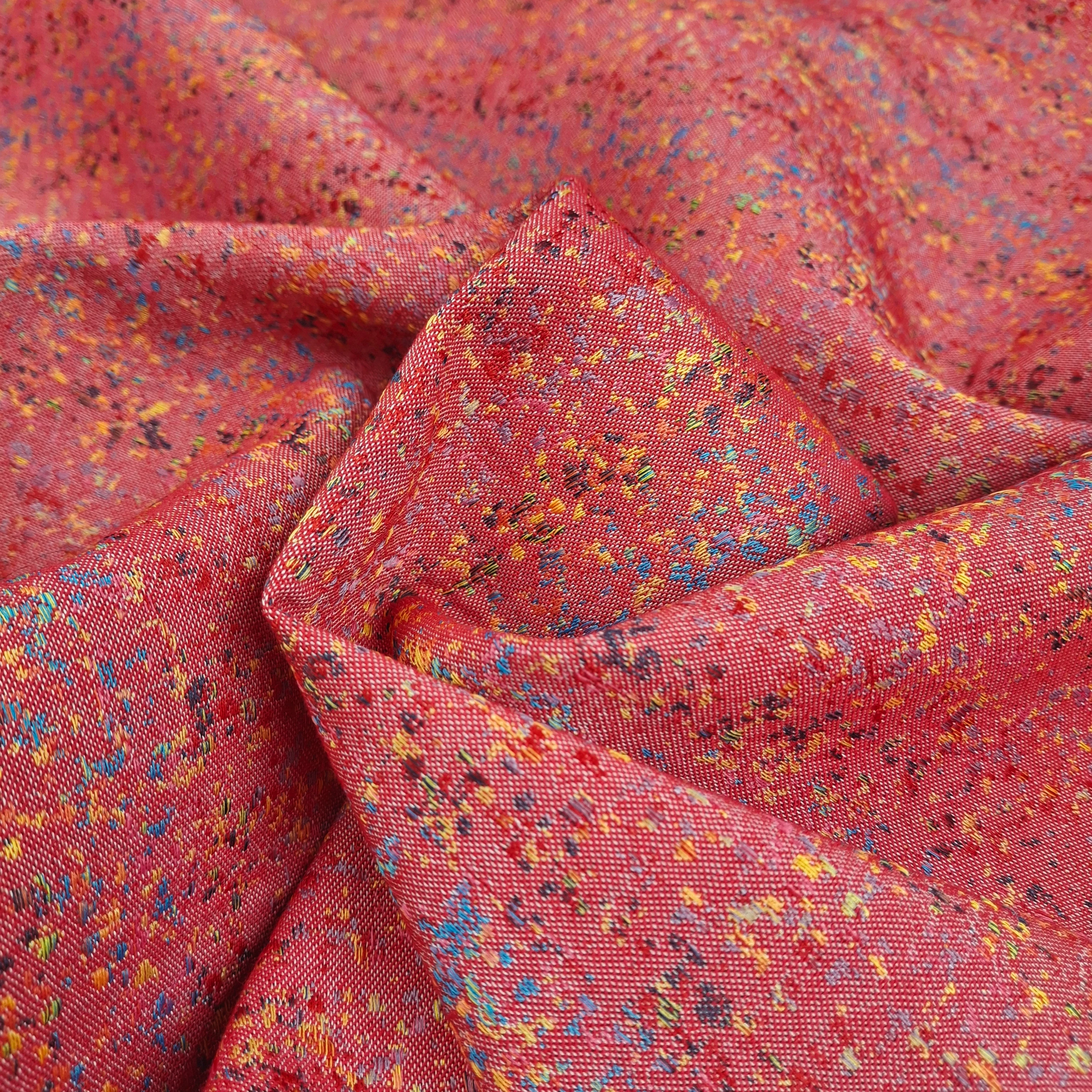 Jacquard, elasztikus – Festékcseppes mintával, élénk korall színben