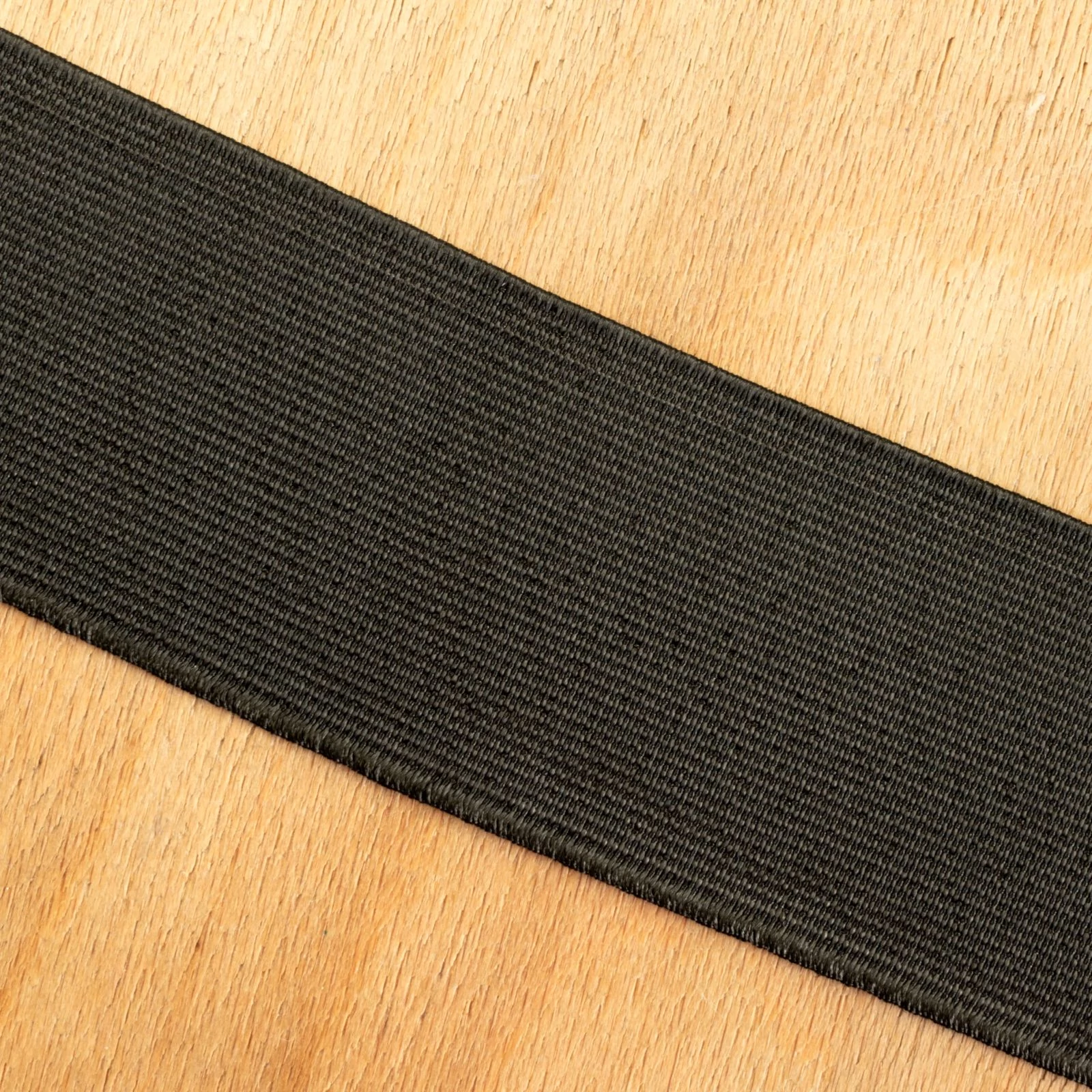 Gumiszalag, szövött – Erős nadrág gumipertli fekete színben, 50mm